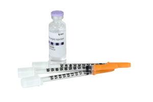 insulin bottle and syringes for a disabetic