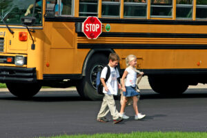 School Bus with Kids walking home